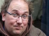 Ein Mann mit Brille im braunen Kapuzenpullover.  (Bildrechte: Christian Cordes)