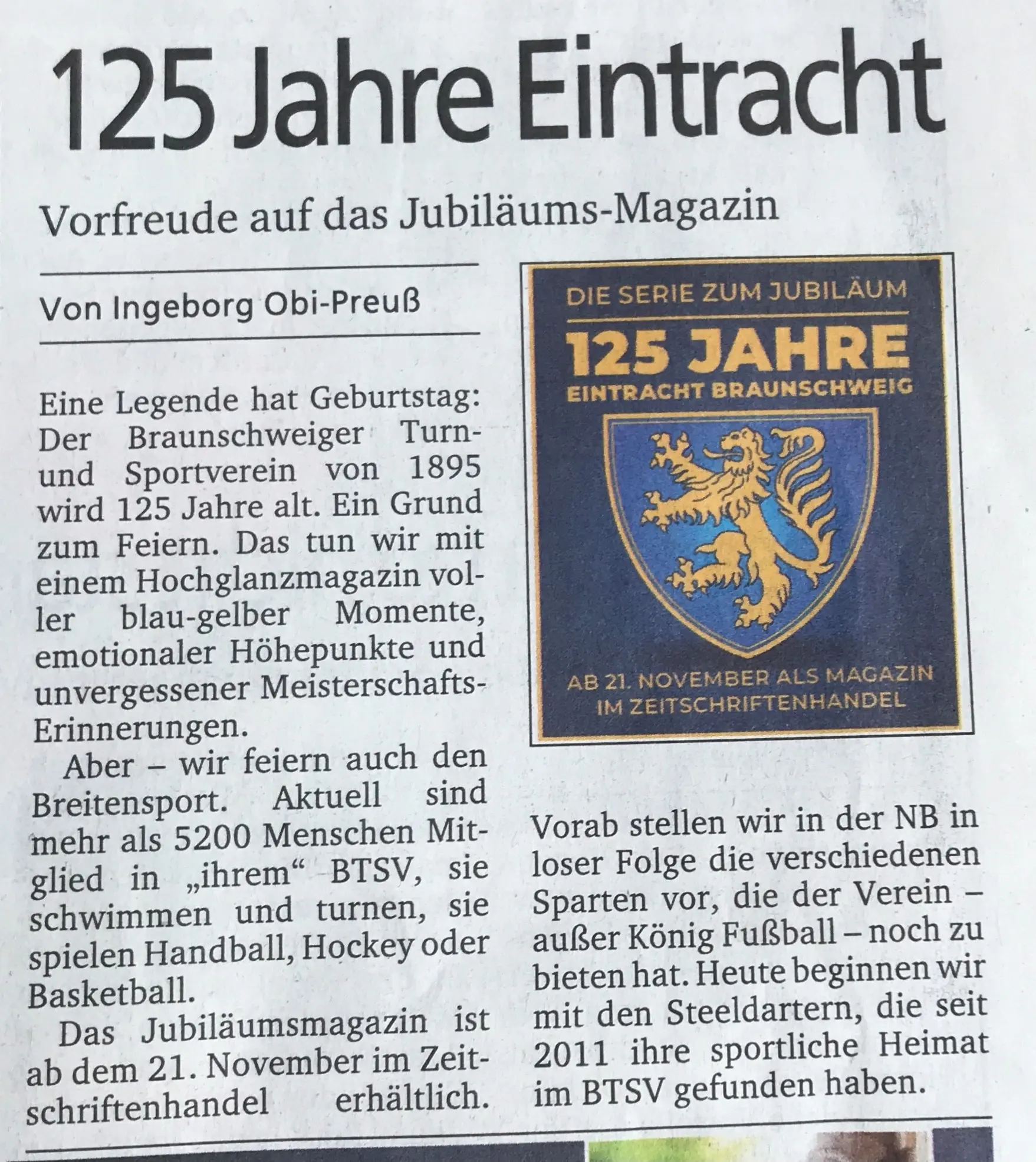 Eine Zeitungsseite mit Foto, welches das Eintracht-Logo zeigt.