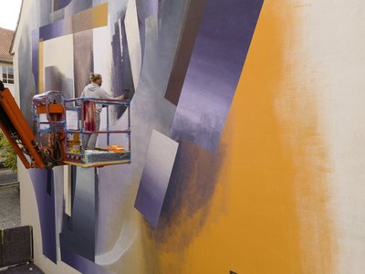 Die Street Art Künstler müssen in großen Maßstäben denken.