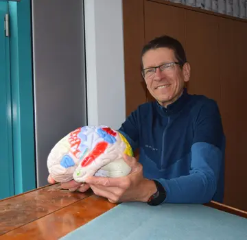 Professor Martin Korte erklärt die Zusammenhänge von Optimismus und neurologischen Prozessen. (Bildrechte: Martina Zingler)