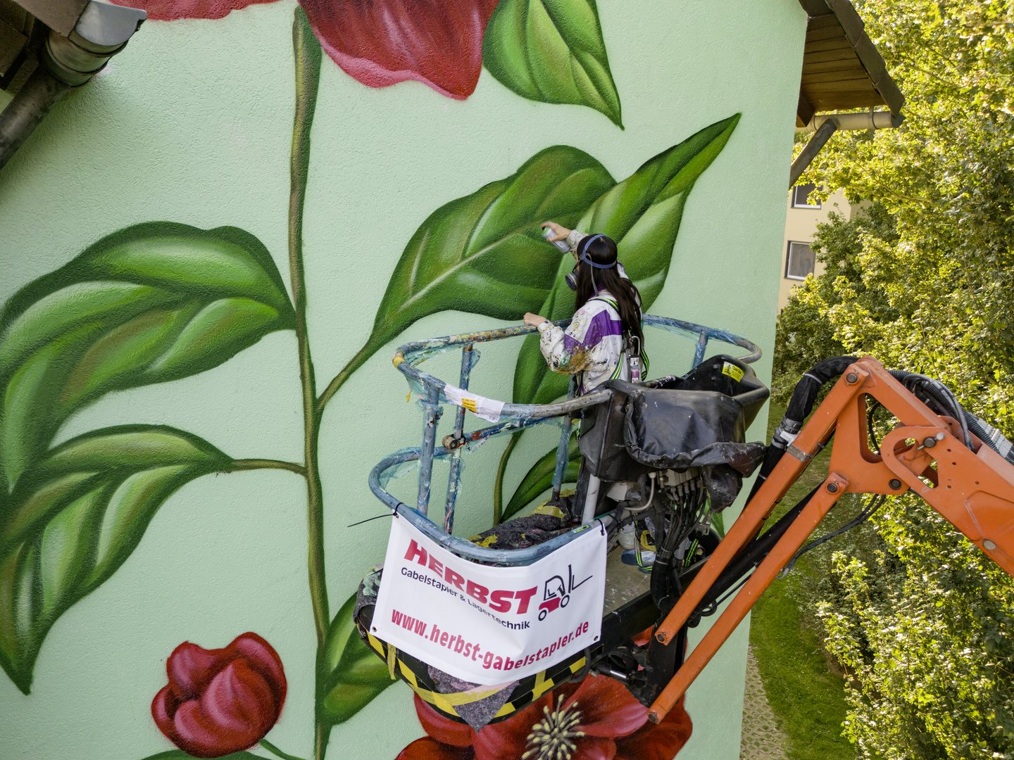 Street Art Künstler dürfen sich an riesigen Hauswänden austoben.